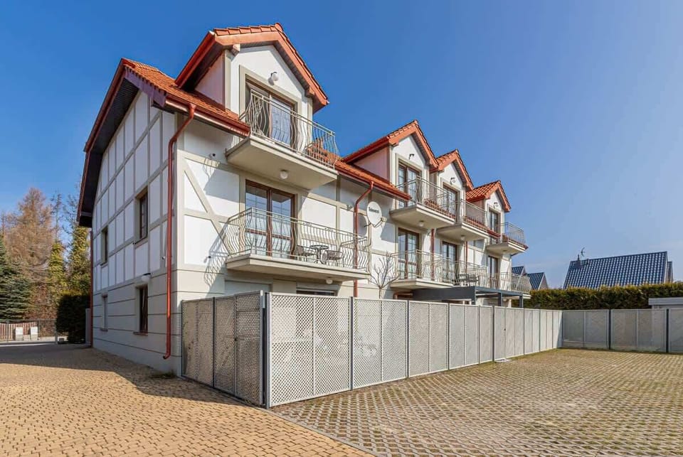 Exterior view of the building – Beautiful coastal-style building just a short walk from the beach.