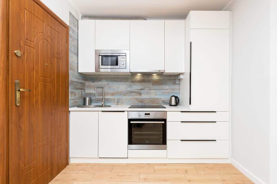 Kitchen entrance view – Convenient layout connecting the kitchen to the main living area.