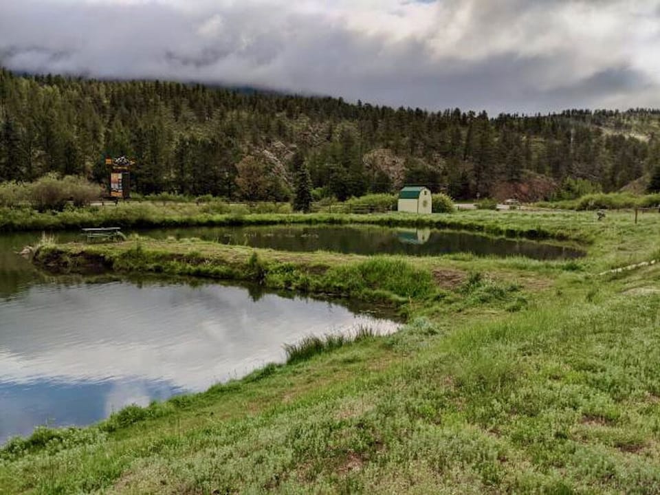 Catch and release fishing pond; HWY 285 in the distance