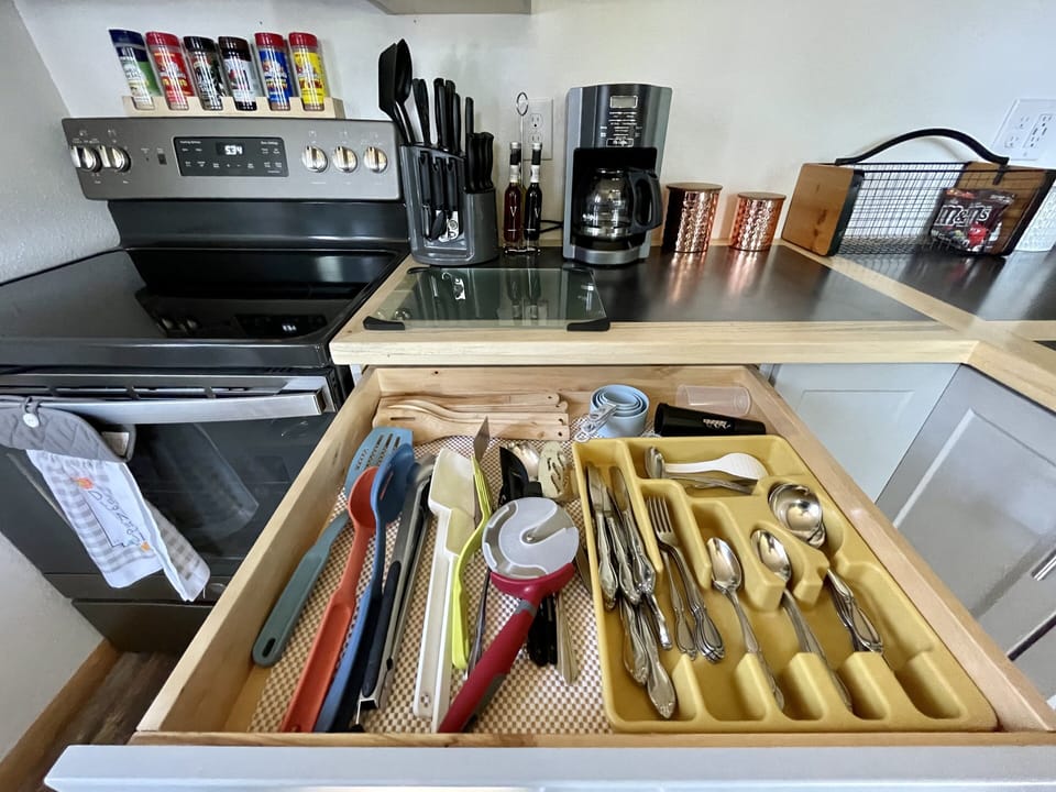 Stocked utensils, coffee pot, and even some of my favorite spices.