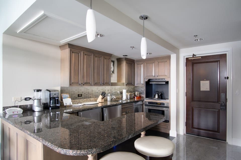 Luxury Suite, Balcony, Ocean View | Private kitchen | Highchair