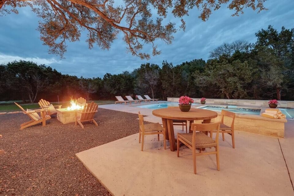 Outdoor Dining Fire Pit and Pool - Walker Luxury Vacation Rentals