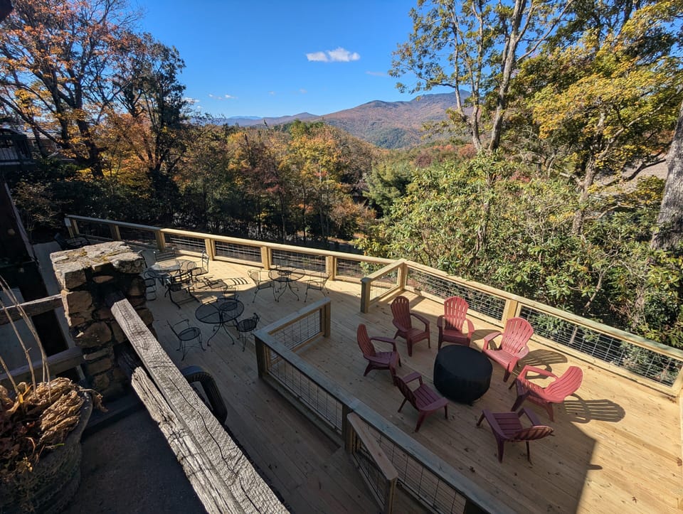 Spacious Lower Deck With Seating and a Fire Pit
