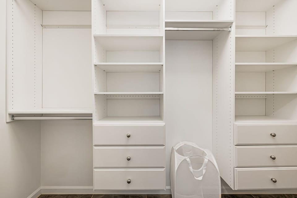 Bedroom One - Walk In Closet with High Chair & Pack n Play