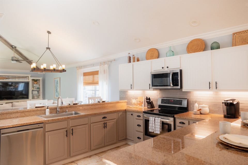 Cook, gather, and connect in the spacious kitchen with ample prep space and nearby dining.