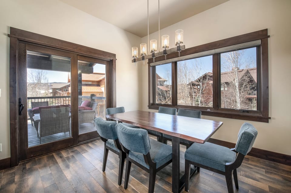 Dining area with walk out deck and grill
