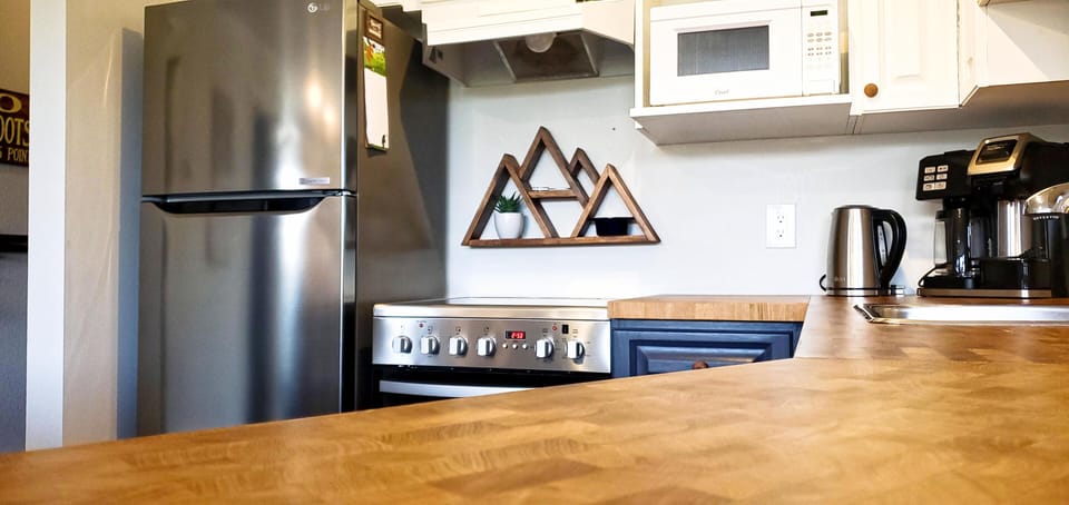 The kitchen is fitted with modern appliances.