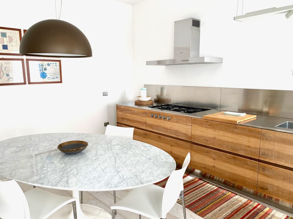 Design Apartment | Private kitchen | Full-size fridge, microwave, oven, stovetop