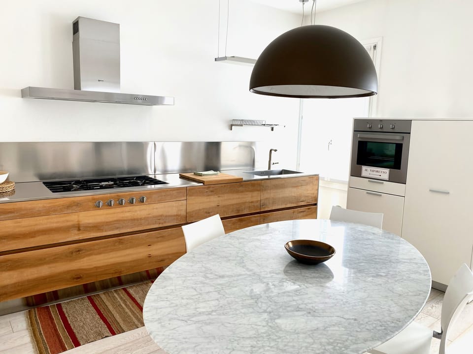Design Apartment | Private kitchen | Full-size fridge, microwave, oven, stovetop