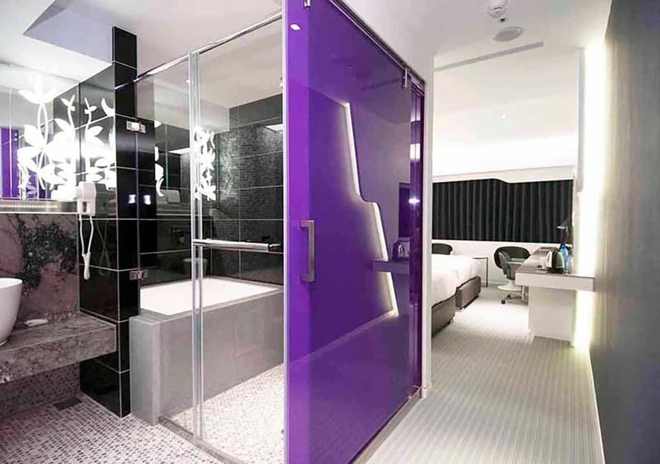 Separate tub and shower, hair dryer, slippers, towels