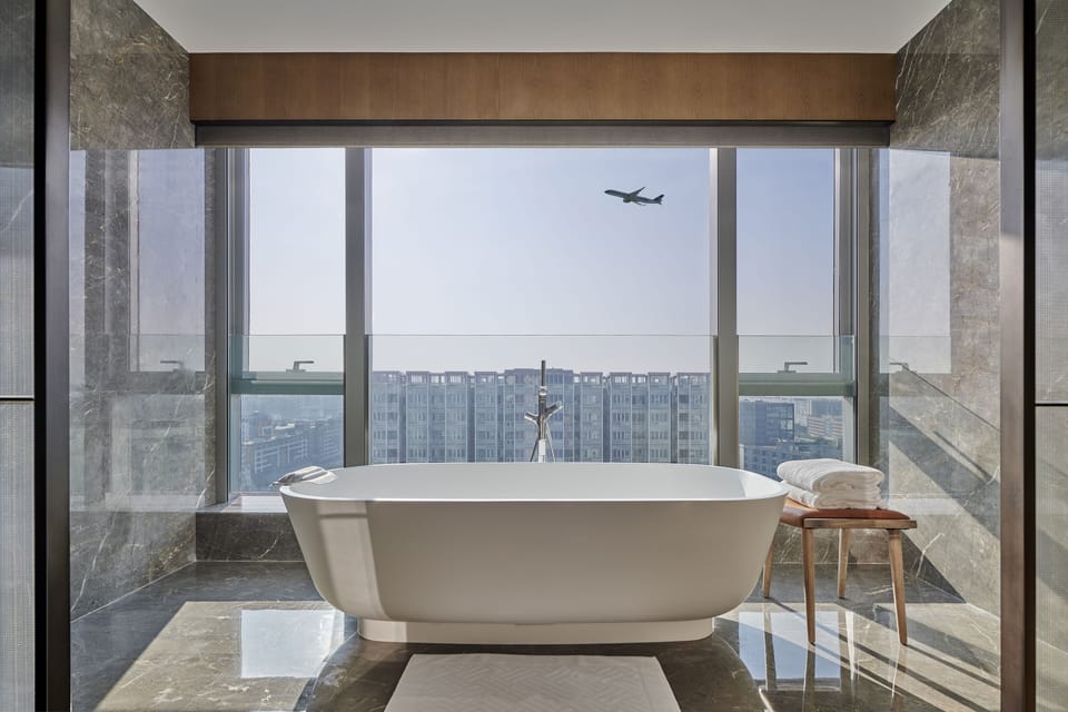 Presidential Suite, 1 King Bed | Bathroom | Separate tub and shower, bathrobes, slippers, towels