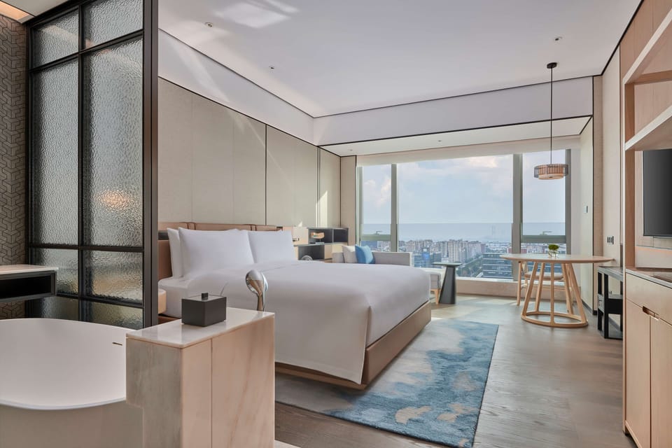 Separate tub and shower, bathrobes, slippers, towels