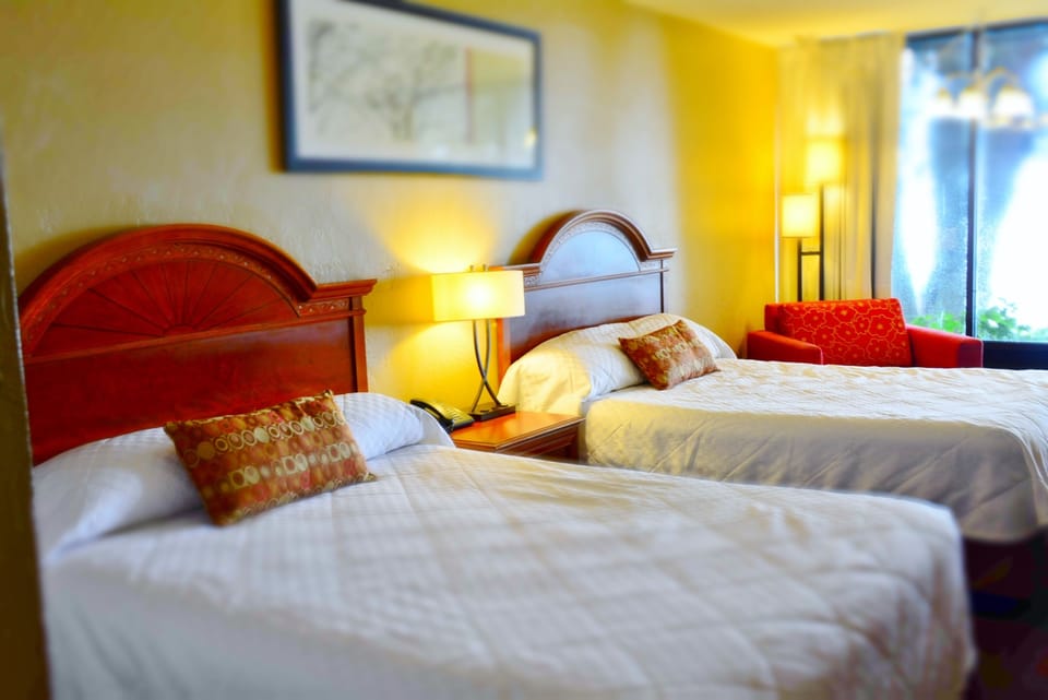 Premium bedding, pillowtop beds, desk, blackout drapes