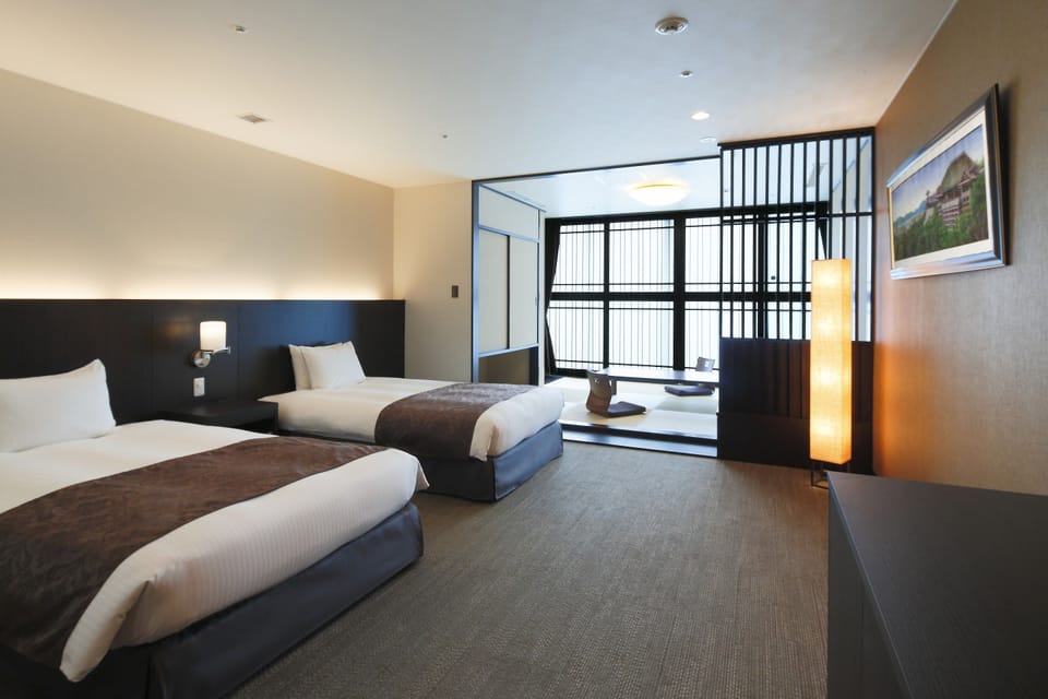 Premium bedding, down comforters, desk, laptop workspace
