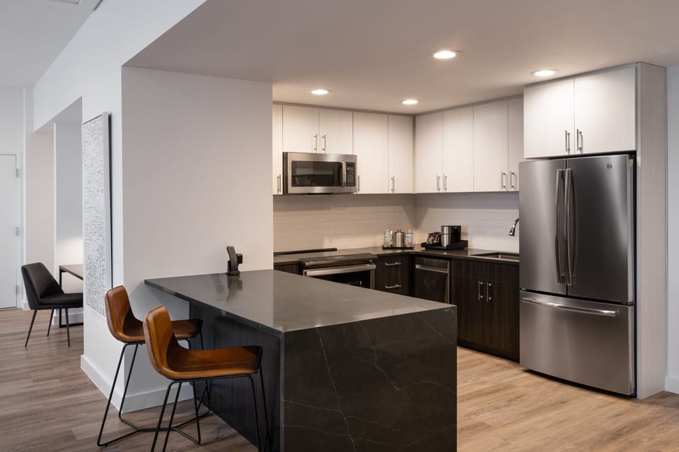 Signature Suite, 1 King Bed, Golf View | Private kitchen | Coffee/tea maker