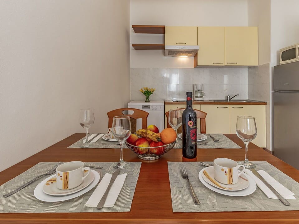 Table, Tableware, Food, Furniture, Dishware, Cabinetry, Plate, Wood, Interior Design