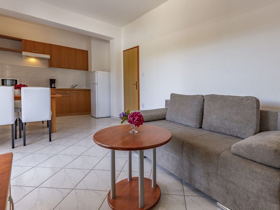 Furniture, Property, Table, Couch, Interior Design, House, Flooring, Wood, Floor, Line
