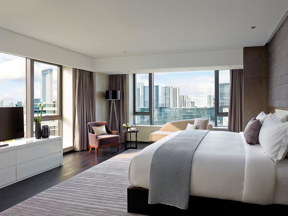 Suite, 1 Bedroom, River View | Minibar, in-room safe, iron/ironing board, free cribs/infant beds