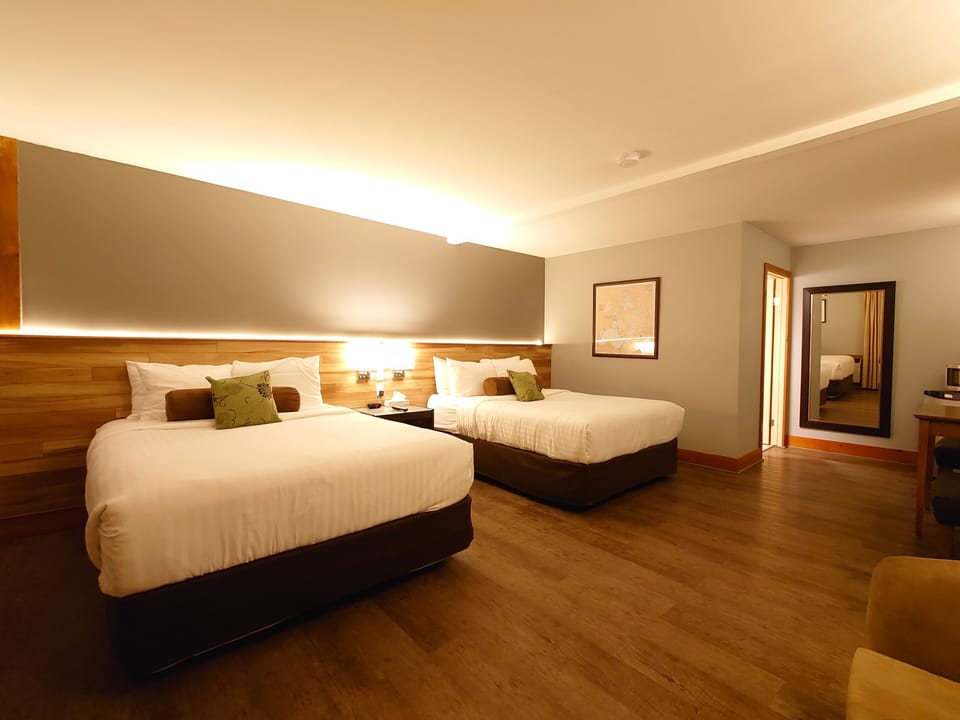Room, 2 Queen Beds | Iron/ironing board, rollaway beds (surcharge), WiFi (free), bed sheets