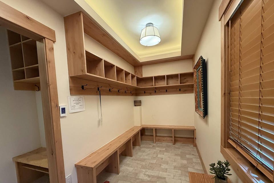 Mudroom just off the front door—perfect for storing ski gear in this convenient ski-in/out home.
