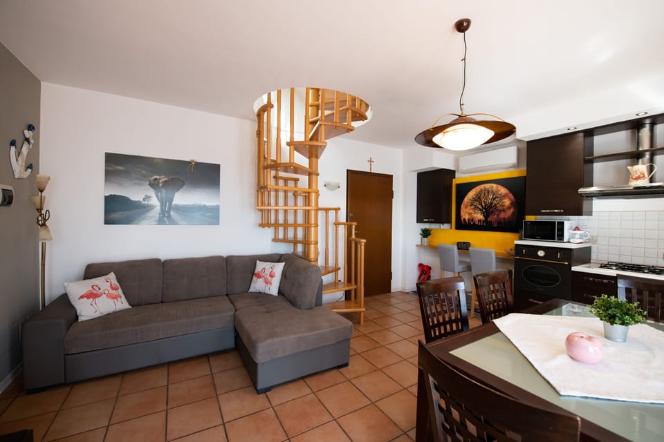 Classic Apartment | Living area | 50-inch TV with cable channels