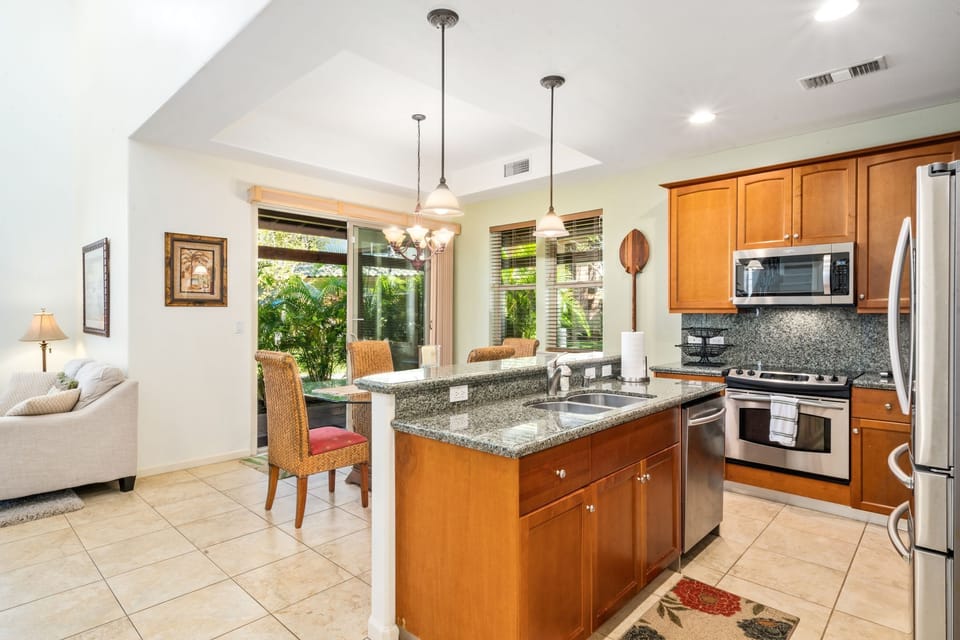 Open layout of kitchen and dining room with amazing natural ligh