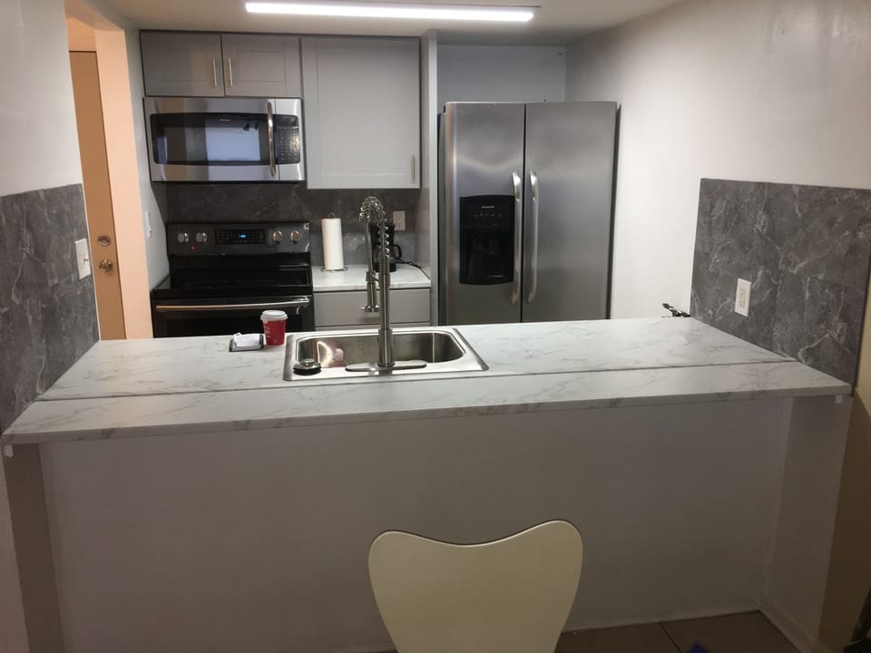 Kitchen counter.  Microwave.