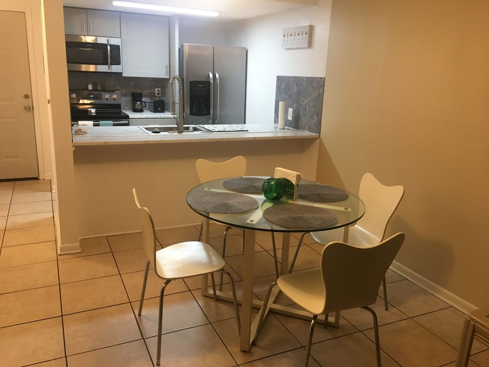 Dining room and kitchen.