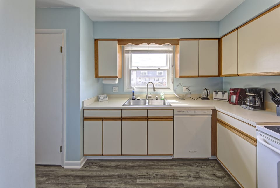 Kitchen facing towards front window