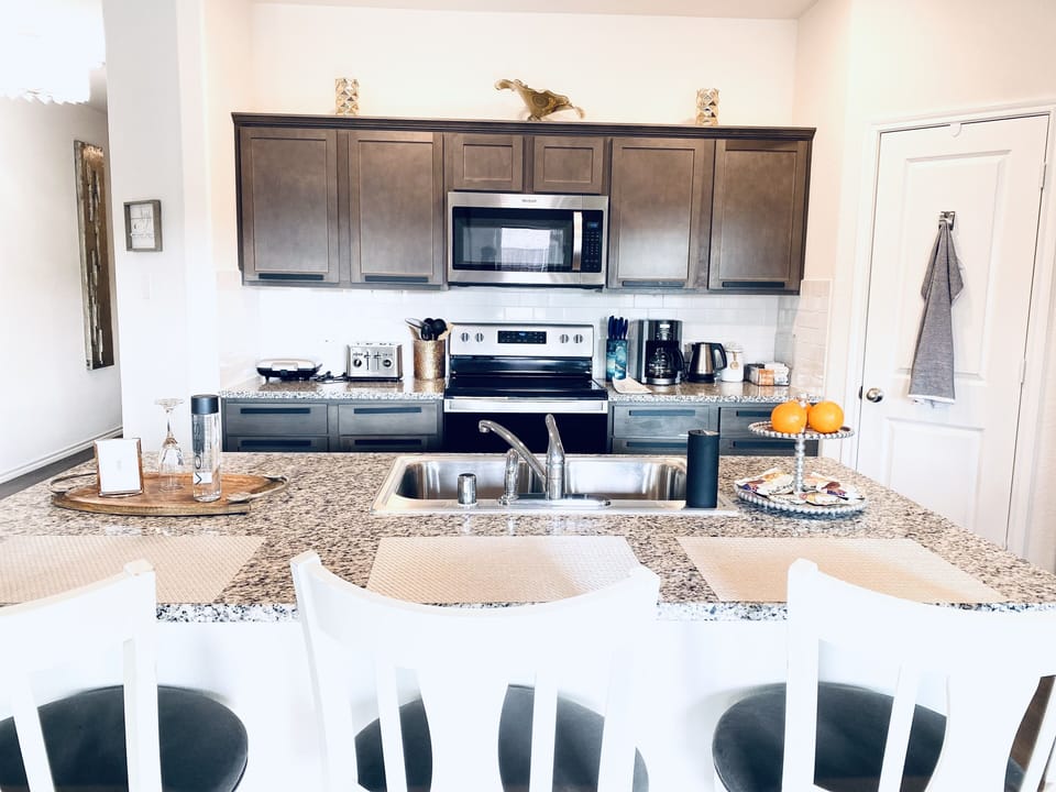 Walk-in pantry. LOTS of pots/pans/appliances/cooking gadgets. Plastic-wares  too