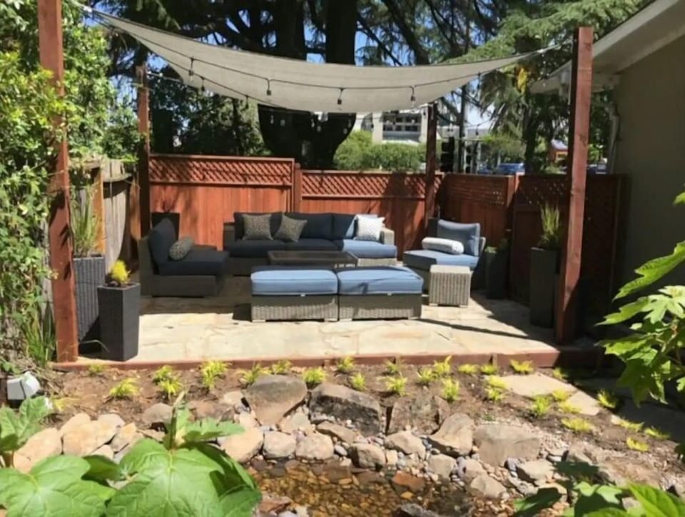 Sunny patio with Weber gas grill
