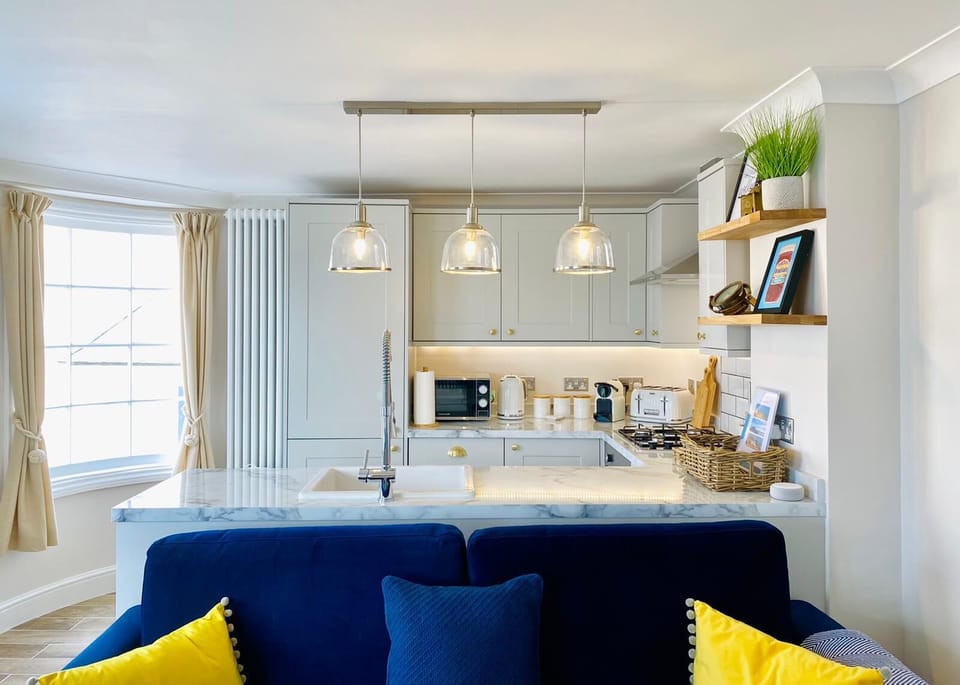 Open plan living room & kitchen stocked with everything you should need