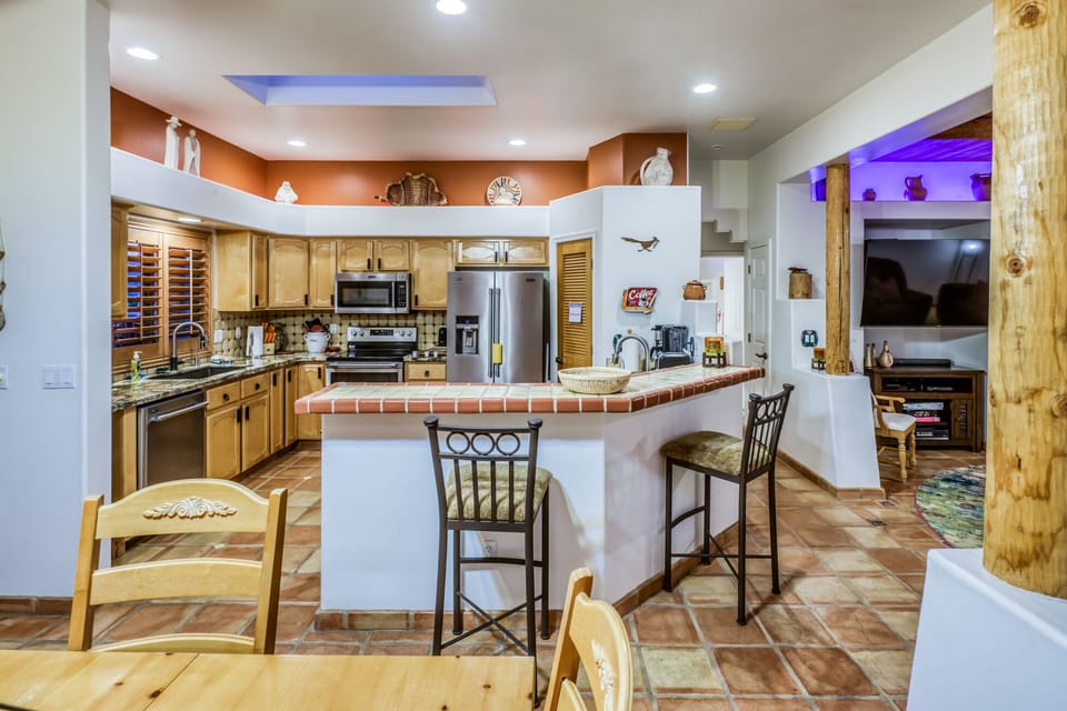 Plenty of counter & prep space, 2 sink areas, and pantry to store away goodies!