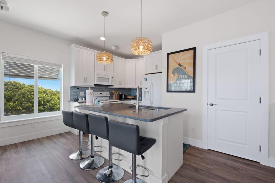 Island with bar stool seating.