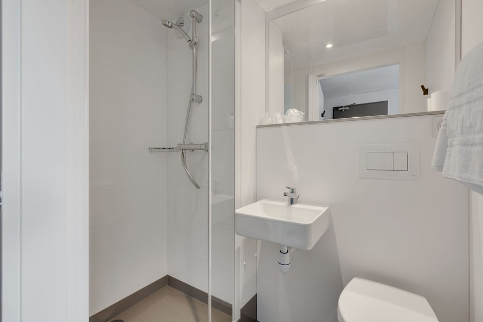 Shower, free toiletries, hair dryer, towels
