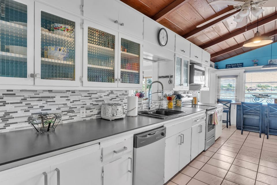 The kitchen comes fully stocked with dinnerware & cookware for your stay!