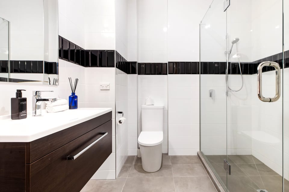 Shower, eco-friendly toiletries, hair dryer, towels