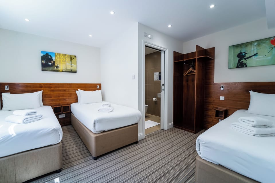 Superior Triple Room | Premium bedding, iron/ironing board, free WiFi, bed sheets