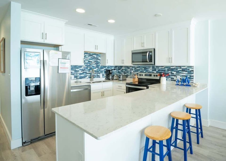 Fully Equipped Kitchen, Countertop Seating For 3