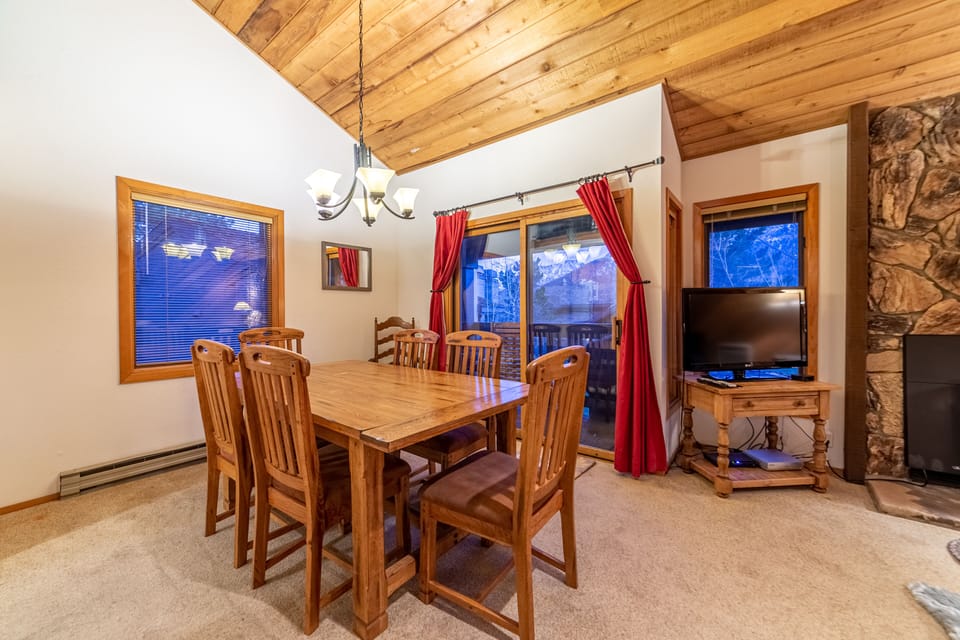 Dining room opens to private deck w/ BBQ.