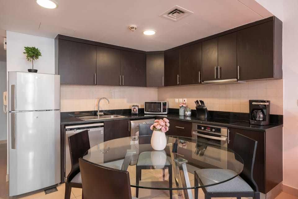 Classic Apartment | Private kitchen | Fridge, microwave, oven, stovetop