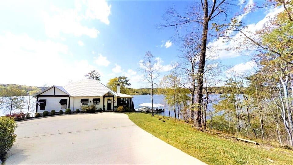 Home sits on 2 acres with very  long drive and lots of parking