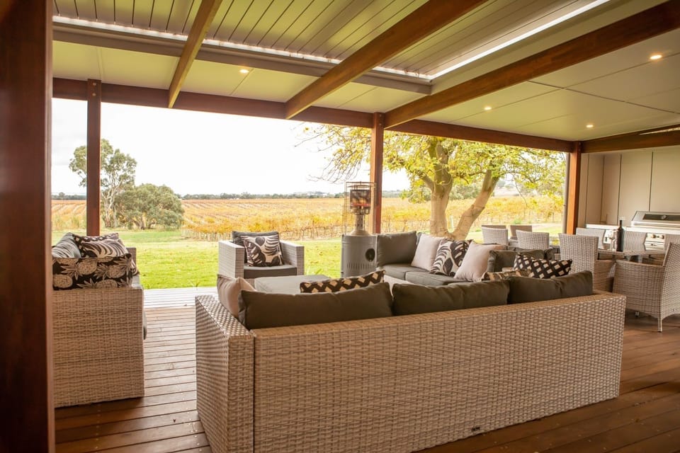 Fine Acres Estate - Deck view with BBQ and dining setting