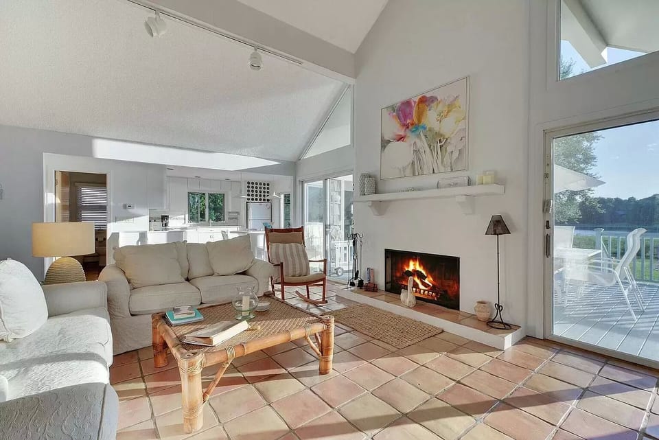 Our amazing living room with vaulted ceilings and fireplace