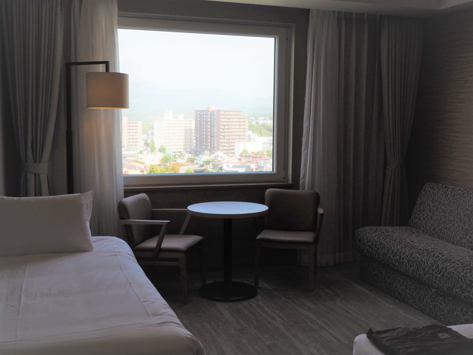 Premium bedding, down comforters, in-room safe, desk