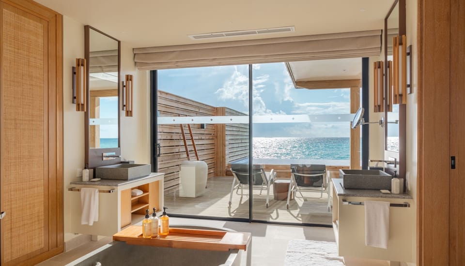 Sunrise Water Villa with Private Pool | Bathroom | Separate tub and shower, rainfall showerhead, free toiletries