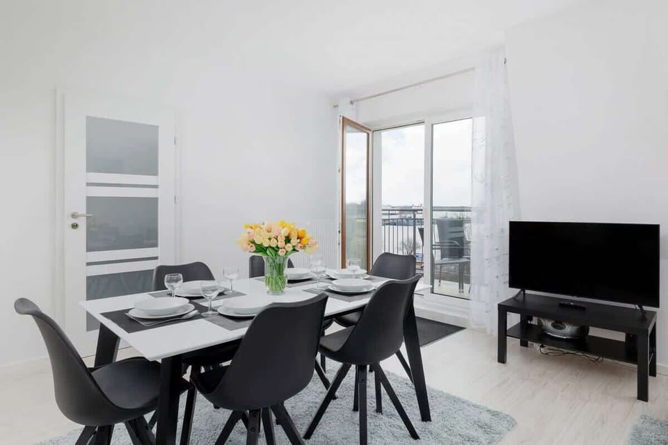 Living room of apartment Armii Krajowej 5/44 with table