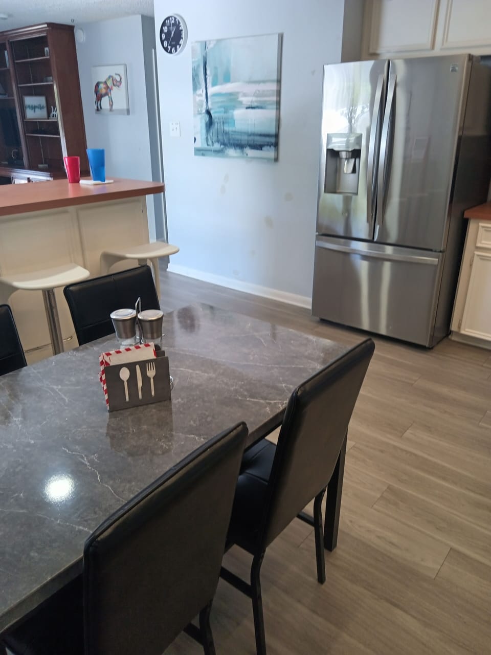 Table, Bar seating, Frige.