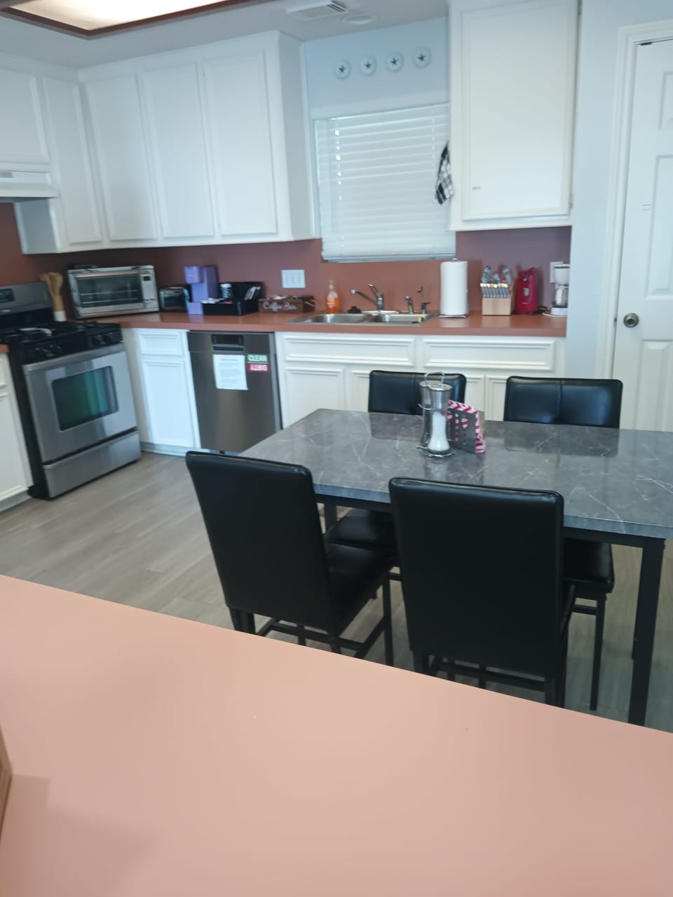 Table, Dishwasher, Oven, Countertop and oven.