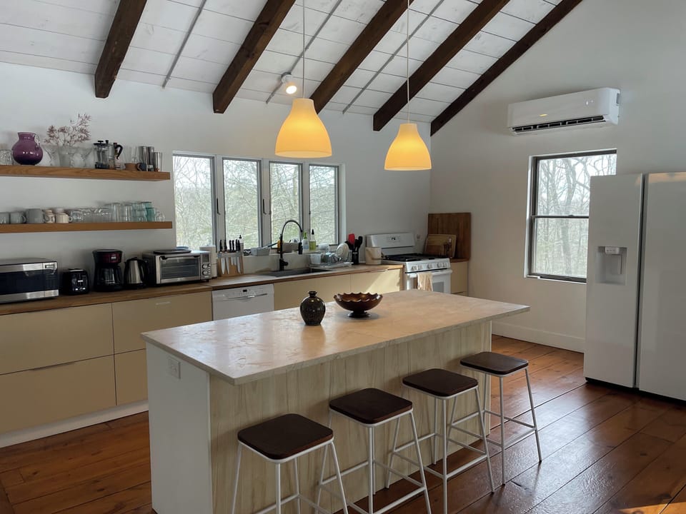 The kitchen space with a brand new fridge with water/ice dispenser